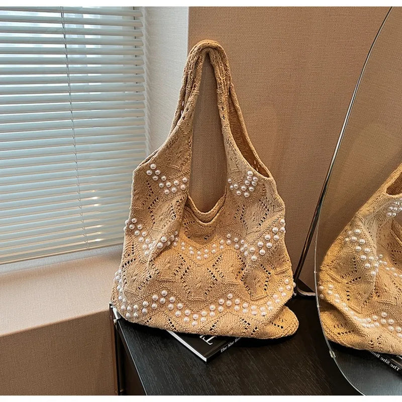 Hollow Out Large Capacity Knitting Shoulder Bags Pearl Unique Design Grace Sense of Luxury Hand Bags for Women 2024 Casual Tote